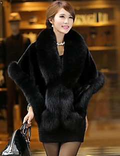 Woman images wearing a faux fur wrap with a cheongsam dress Woman images wearing a faux fur wrap with a cheongsam dress